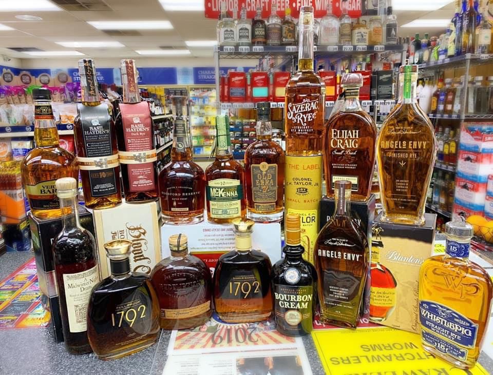 A curated bourbon and whiskey display at Benstein Liquor